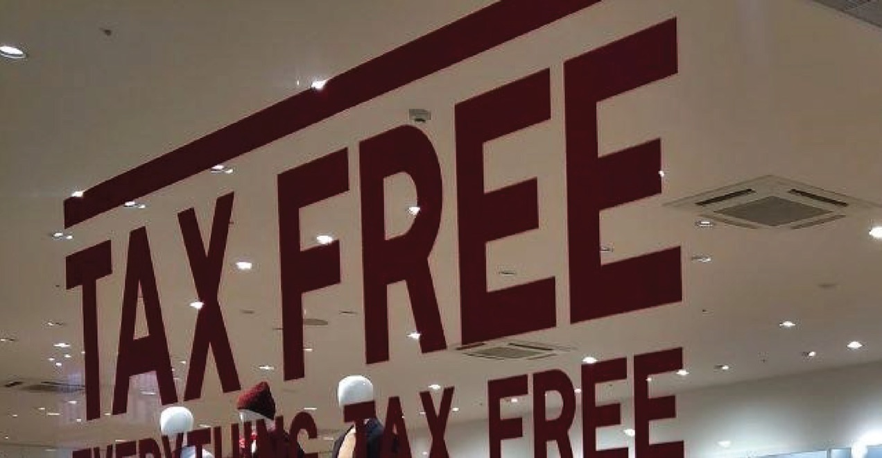 Sign displaying tax free promotion.