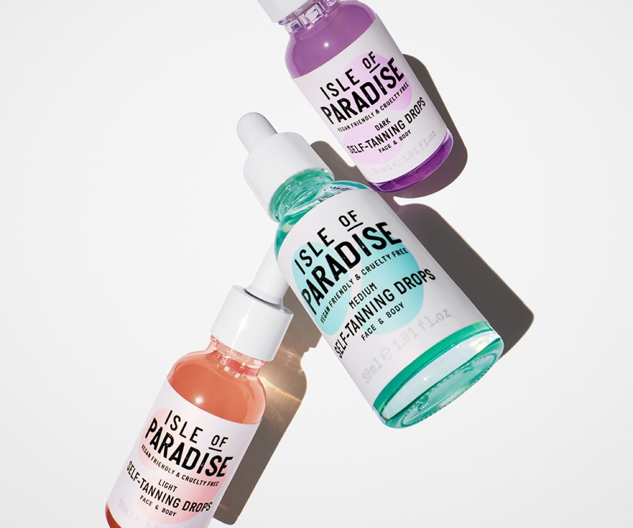 bottles of self-tanning drops